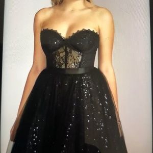 Strapless sparkle illusion corset ball gown